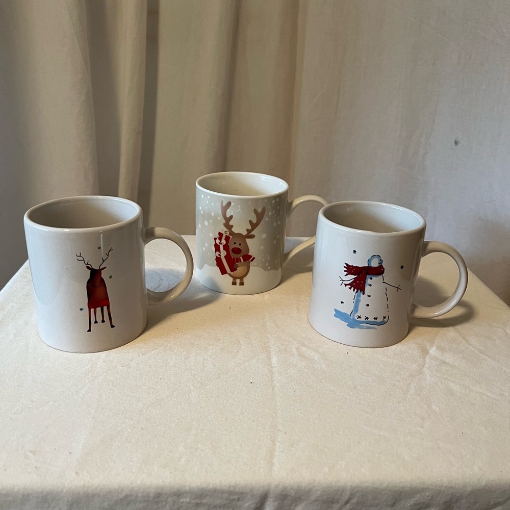 Three sweet winter holiday Christmas mugs with Reindeer and Snowman